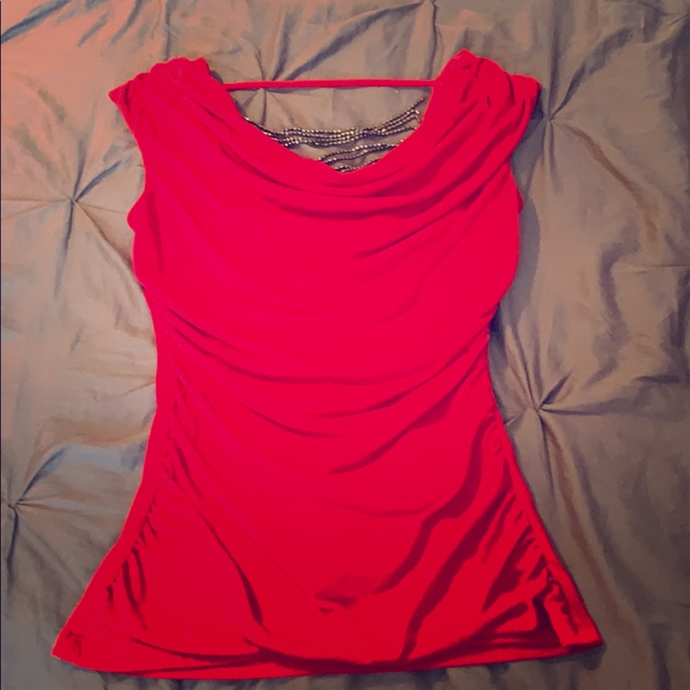 Short sleeve tee. Never worn. Very elegant